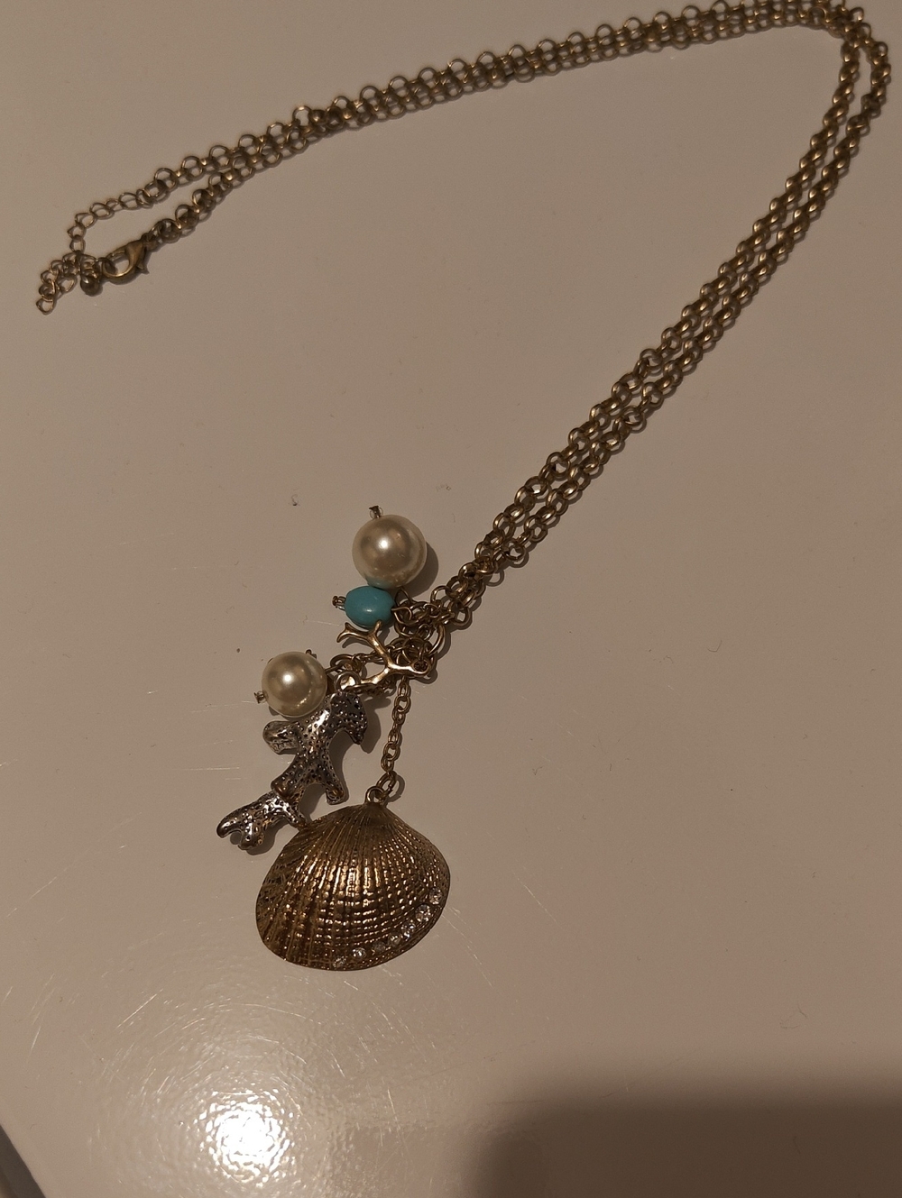 Gold Shell & Charm Necklace with Turquoise Accent - Women's Jewelry